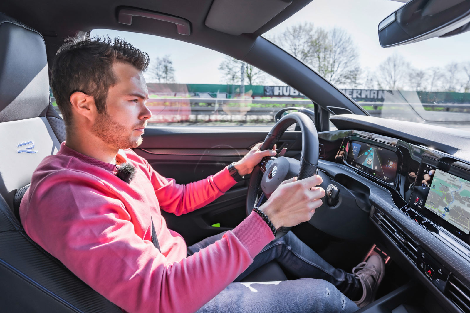 Story "What pro racer Benjamin Leuchter really appreciates about his Golf R is the assistance systems and the Travel Assist surroundings display."